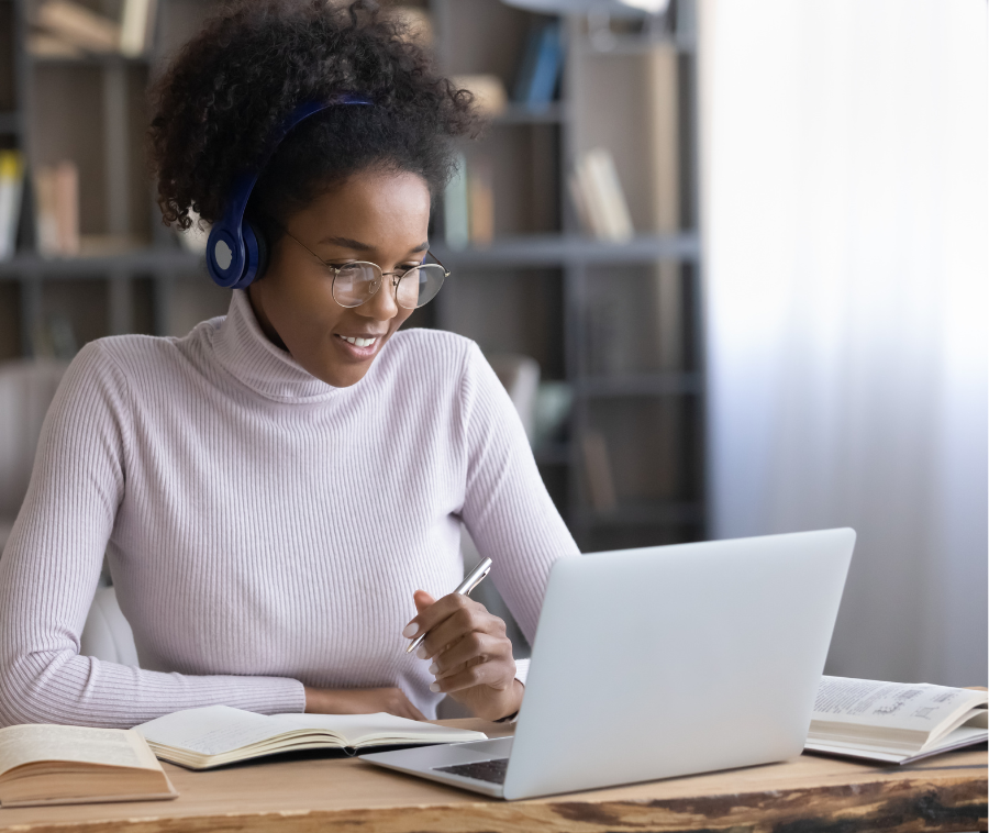 Lady on video call taking notes